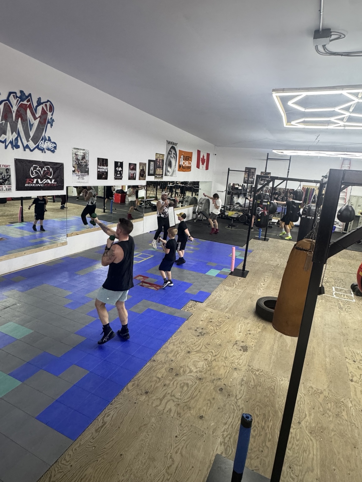 Youth and adult athletes training together at BFCA
